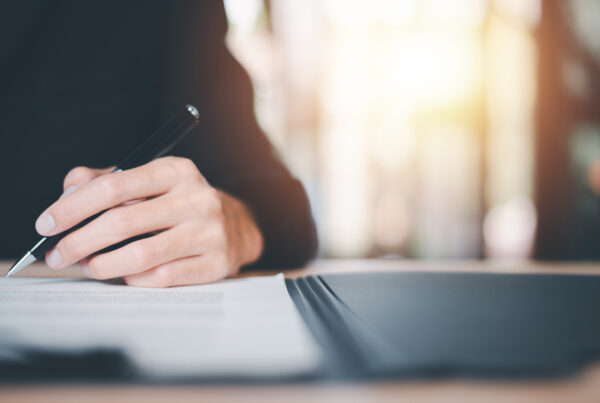 Businessman validates and manages business documents and agreements
