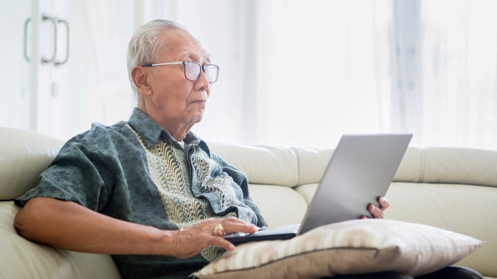 2 Older man on his laptop