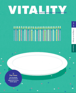 Cover of Vitality Magazine Spring 2019 issue with plate and many birthday candles among confetti