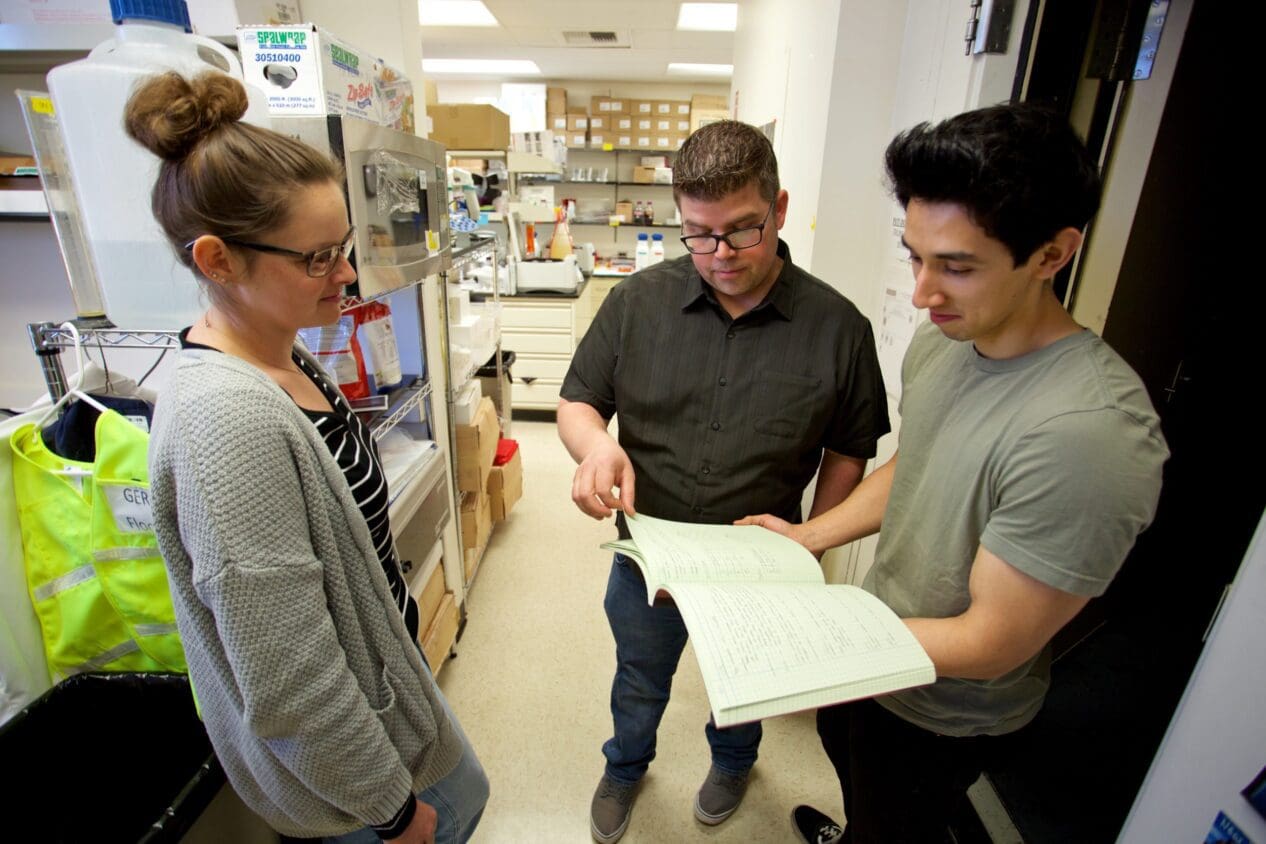 Sean Curran and students in USC laboratory