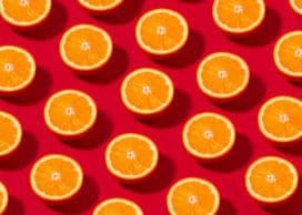 Orange Fruit Pattern on Red Background