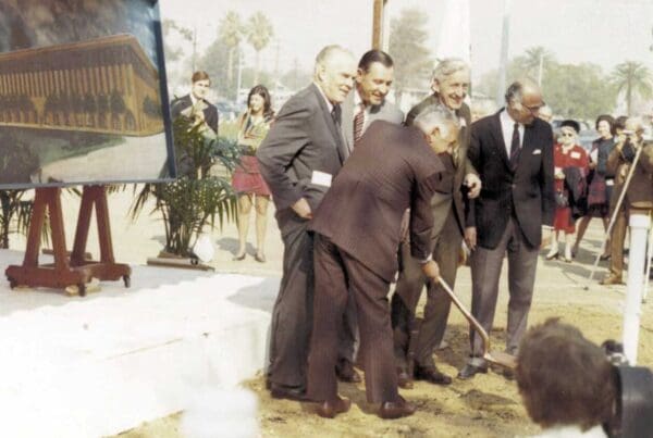 Men in suits gathered around a shovel, breaking ground for the Ethel Percy Andrus Gerontology Center in 1971